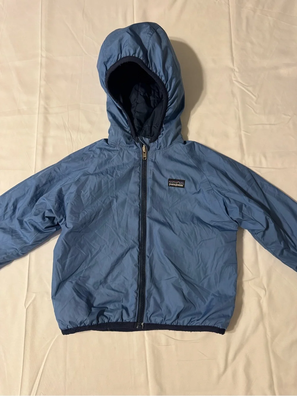 Patagonia Kids reversible Hooded Puffer Jacket in Light Blue with Navy Trim
